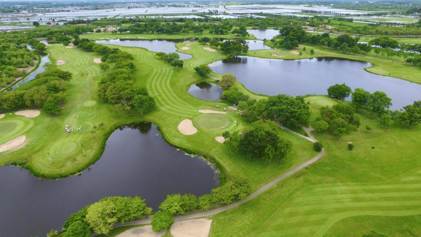Uniland Golf & Country Club fairway and green - golf course Thailand